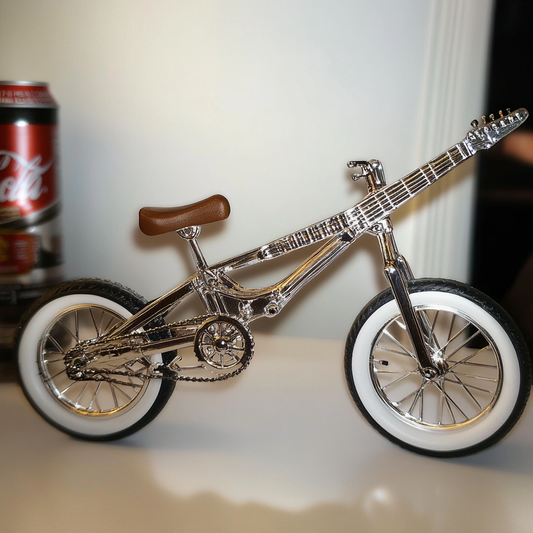 Guitar-Bike Drop 001 – 6-inch die-cast chrome toy with boxed packaging